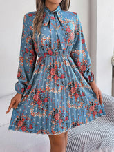 Load image into Gallery viewer, Pleated Printed Tie Neck Long Sleeve Dress