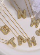 INITIAL PAVE RHINESTONE BUBBLE BALLOON
NECKLACE