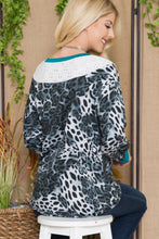 Load image into Gallery viewer, Celeste Full Size Animal Print Eyelet V-Neck Top
