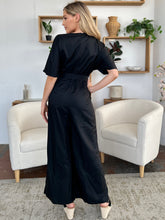 Load image into Gallery viewer, Double Take Full Size V-Neck Tie Front Short Sleeve Slit Jumpsuit
