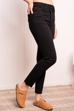 Load image into Gallery viewer, RISEN Full Size Asymmetrical Waist Raw Hem Jeans in Solid Black
