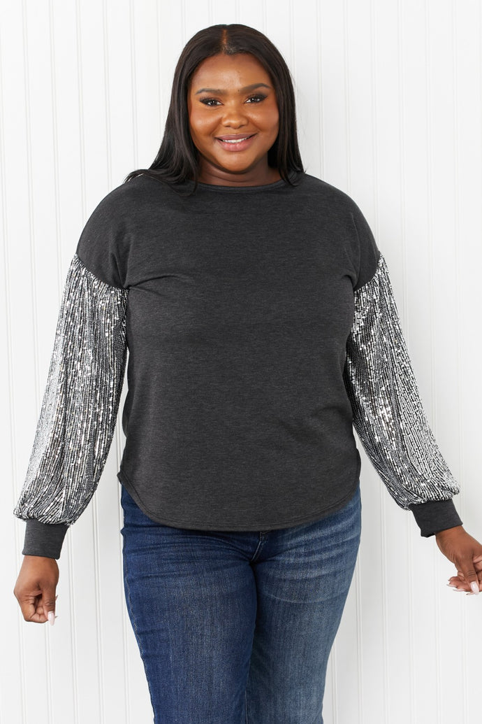 HOPELY Full Size Sequin Puff Sleeve Curved Hem Top in Charcoal