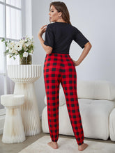 Load image into Gallery viewer, Round Neck Cropped Tee and Plaid Joggers Lounge Set
