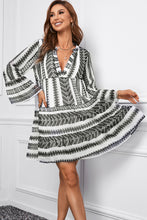 Load image into Gallery viewer, Printed Notched Neck Flare Sleeve Tiered Dress
