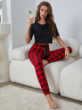 Load image into Gallery viewer, Round Neck Cropped Tee and Plaid Joggers Lounge Set
