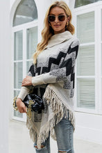Load image into Gallery viewer, Chevron Mock Neck Fringe Hem Poncho
